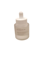 Ampolla iluminadora K-Chic Skin SKIN1004 con niacinamida y centella asiática en frasco de vidrio esmerilado de 30 ml