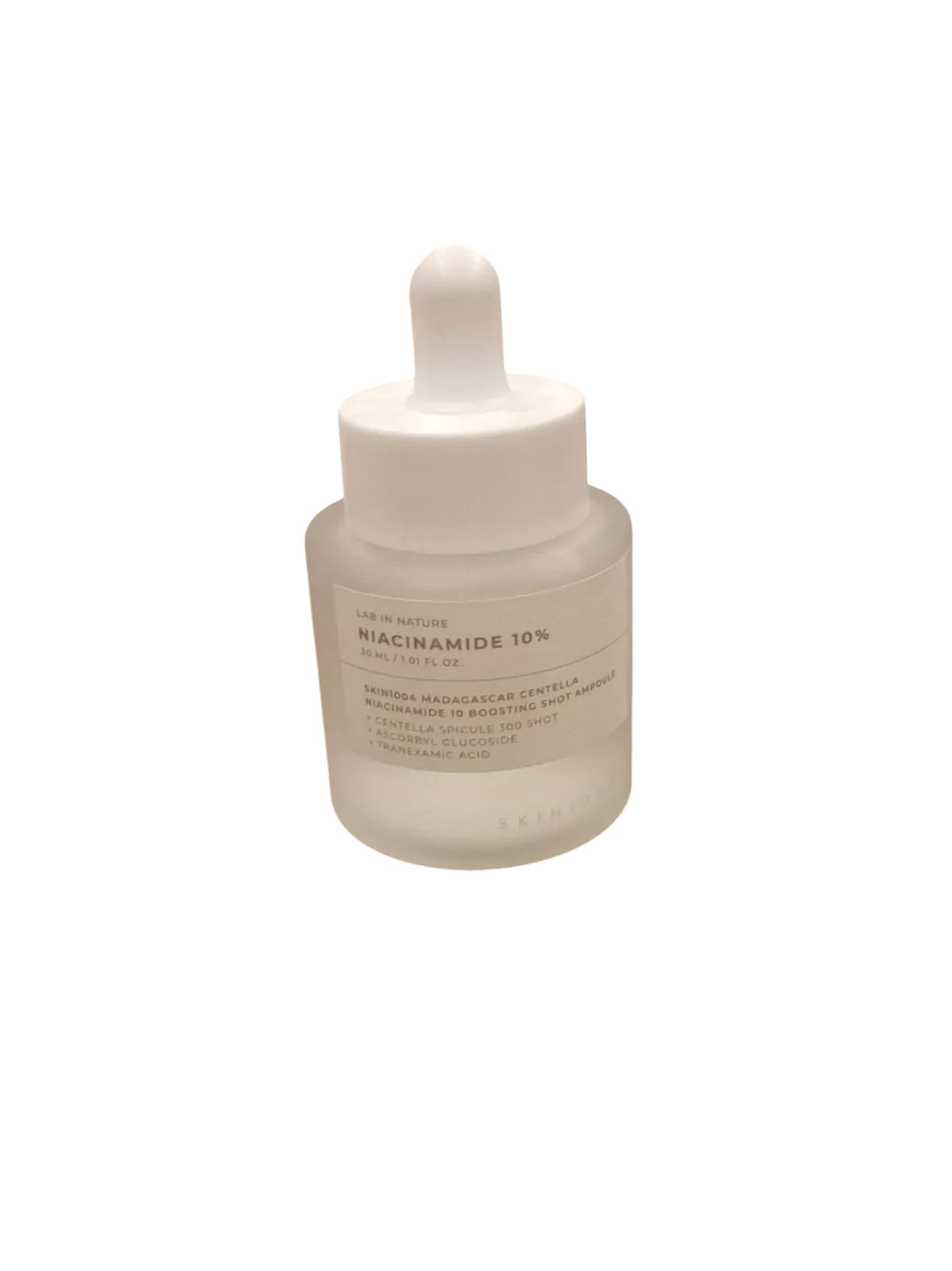 Ampolla iluminadora K-Chic Skin SKIN1004 con niacinamida y centella asiática en frasco de vidrio esmerilado de 30 ml