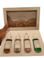 Kit de 4 ampollas faciales SKIN1004 Madagascar Centella de K-Chic Skin Especialidad en caja con diseño de paisaje