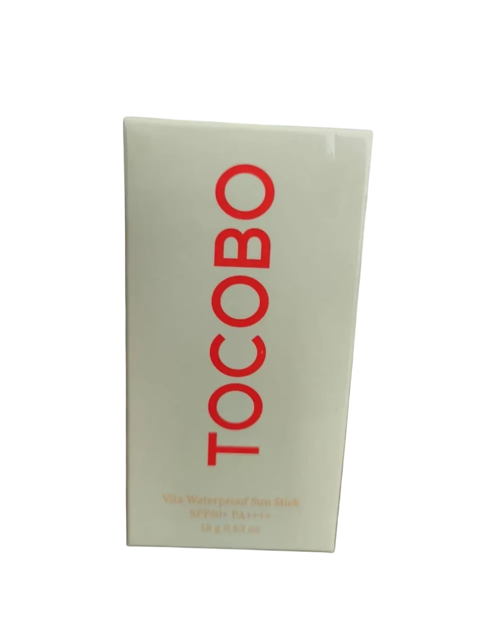 Protector solar en barra TOCOBO Vita Waterproof SPF50+ de K-Chic Skin Especialidad en envase color crema con letras rojas