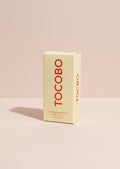 Caja de protector solar en barra TOCOBO Vita Waterproof Sun Stick SPF50+ de K-Chic Skin Especialidad en tono crema